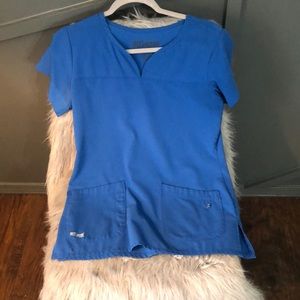 Grey’s anatomy lightly used scrub top. Blue S